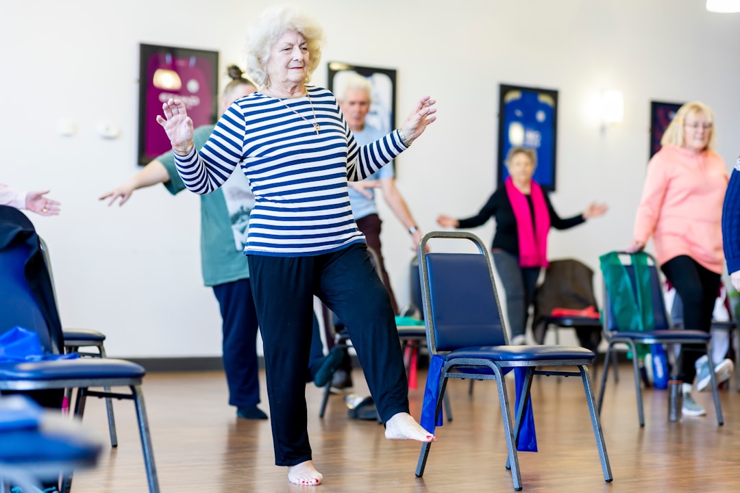 Senior adults practicing balance training for active aging