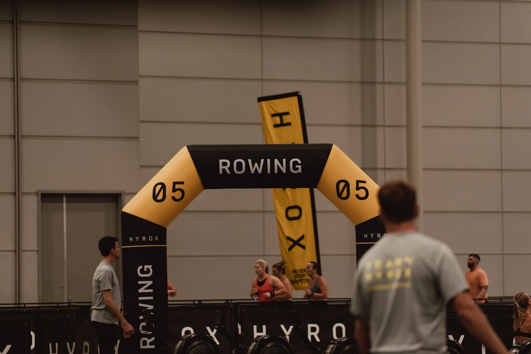 Hyrox fitness race athletes training indoor gym