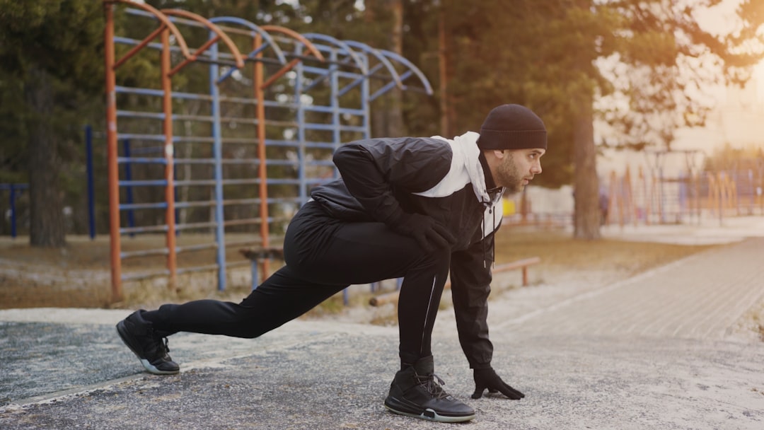 Athlete holding stretch position between training sets