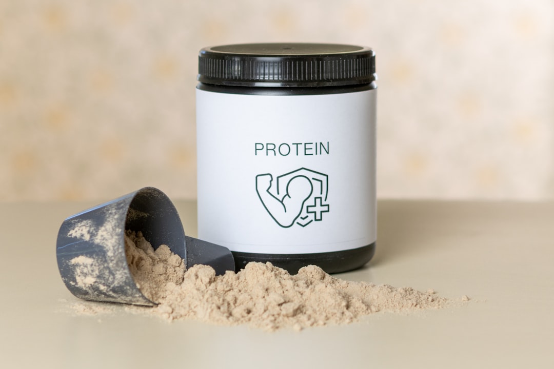 Protein powder scoop leucine amino acids supplement for muscle protein synthesis