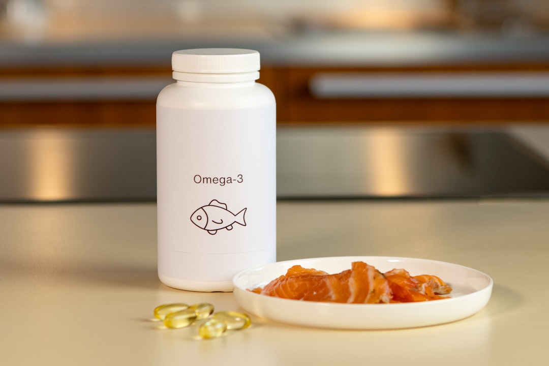 Omega 3 fish oil capsules with salmon for nutrition and recovery