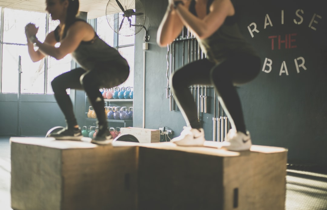 Athlete performing plyometric box jump explosive power training